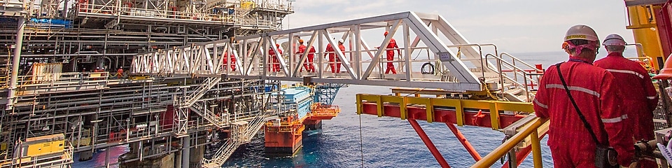 Workers cross over to a new compression deletion platform built alongside the existing Malampaya deep-water project