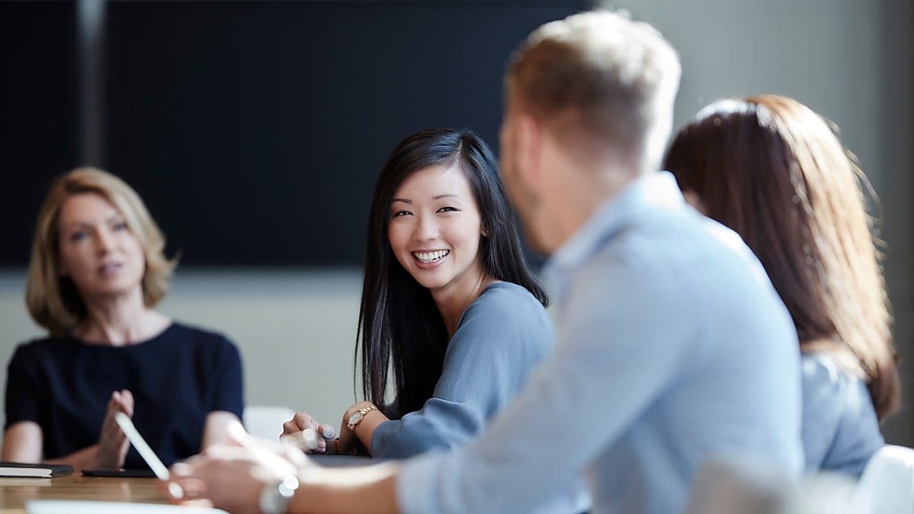 man and three women in the meeting