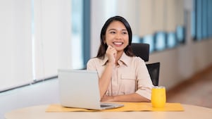employee working on her laptop