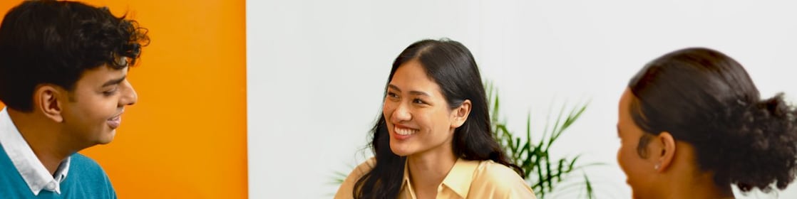 People having a discussion in office