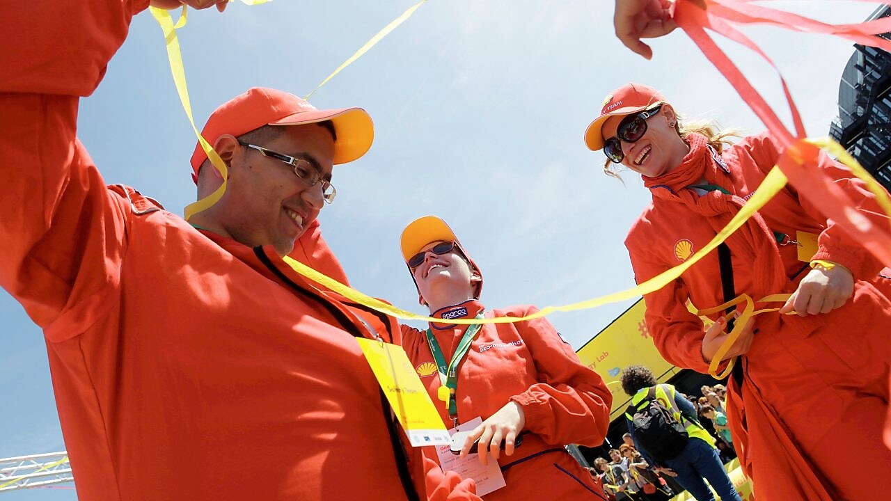A group of Shell employees celebrating