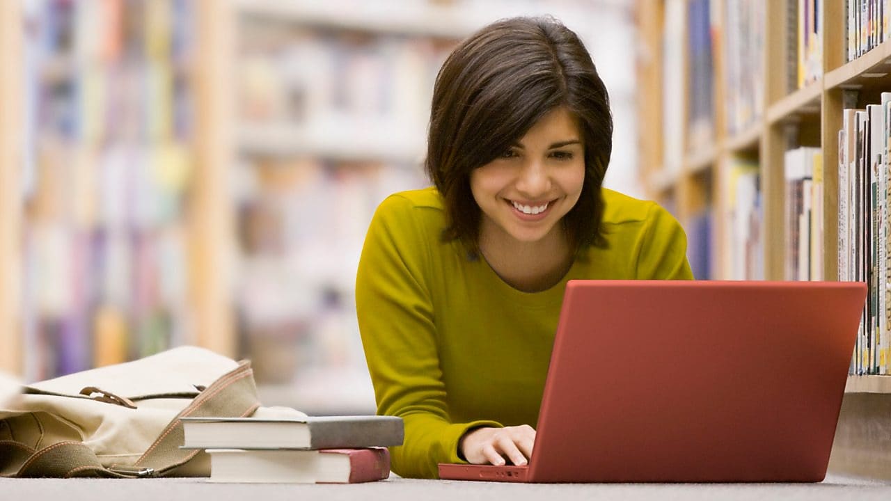 Woman looking at her laptop screen
