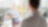  Man holding a Tab while looking at mirror