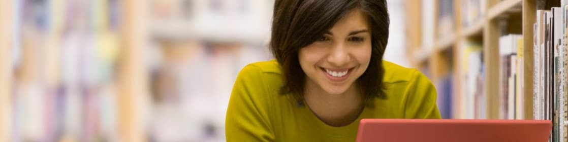 Woman looking at her laptop screen