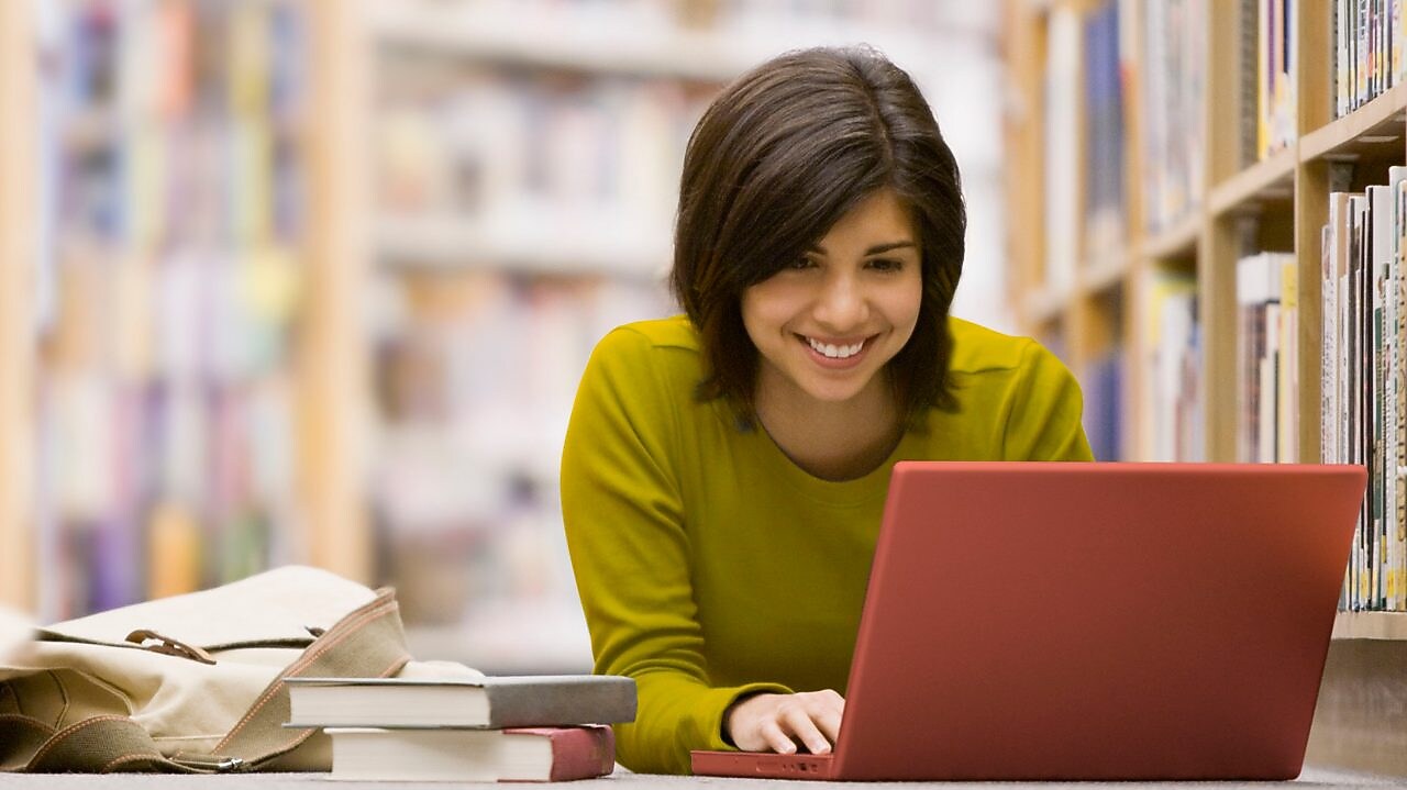 Woman looking at her laptop screen
