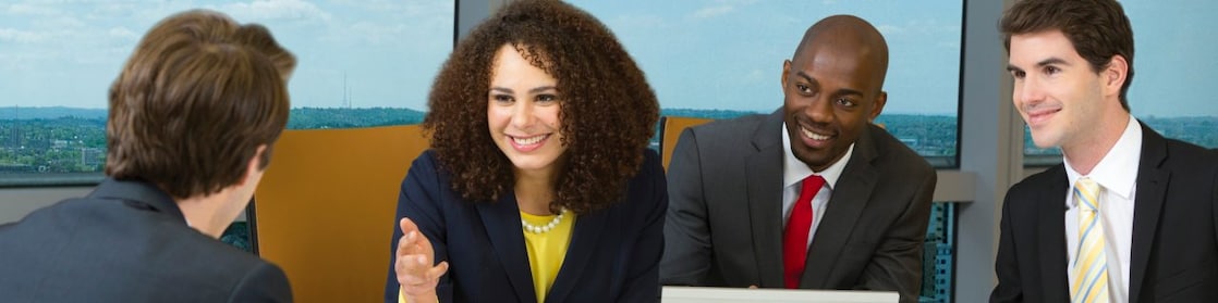 four shell employees in a meeting