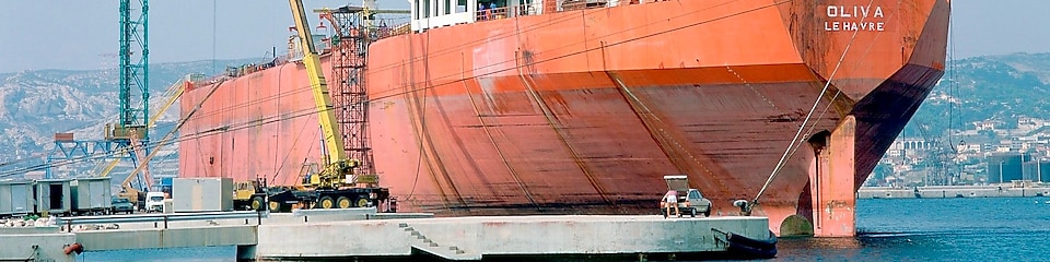 Cargo ship docked at a terminal