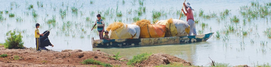 Local people on the Yabani Canal in the South of Iraq