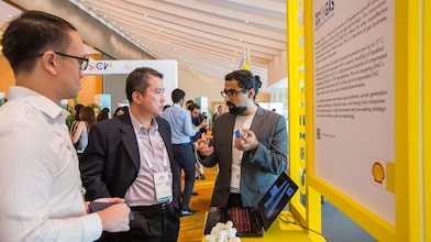 three people discussing