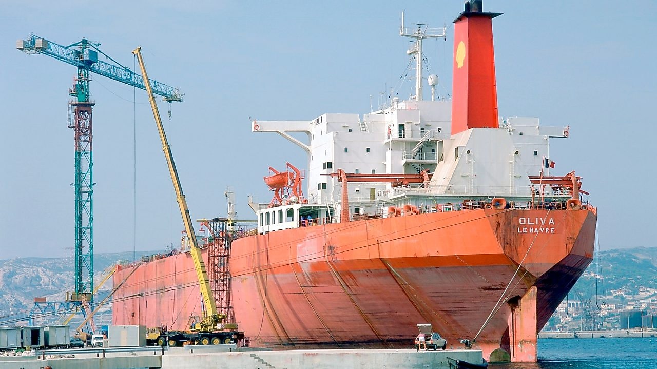 Cargo ship docked at a terminal