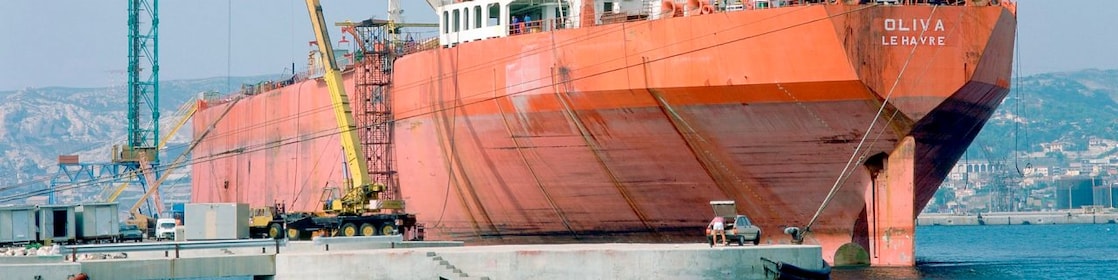 Cargo ship docked at a terminal