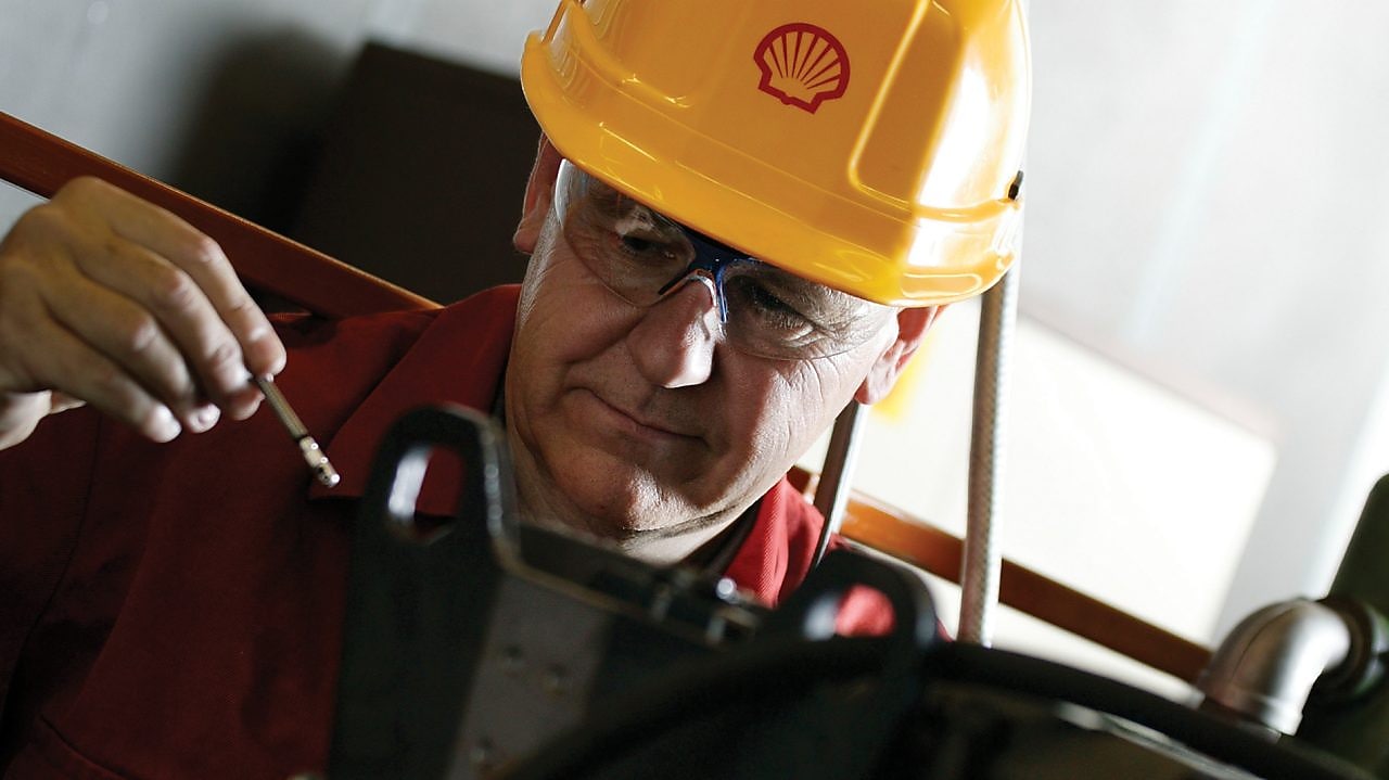 Shell worker with helmet