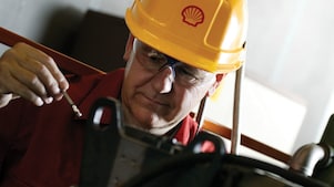 Shell worker with helmet