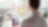 Man holding a Tab while looking at mirror
