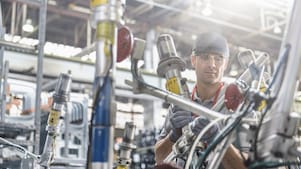 Engineer working with Shell lubricants