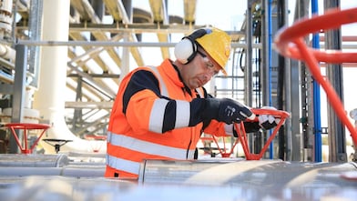 engineer working on a pipeline