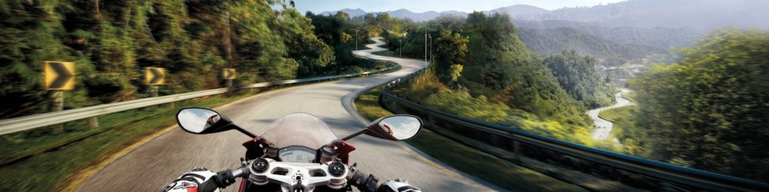 Man riding a bike which is using the Superior Engine Oil For Bikes