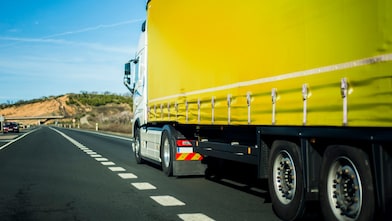 Yellow truck on the road