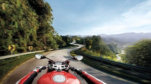 Man riding a bike which is using the Superior Engine Oil For Bikes
