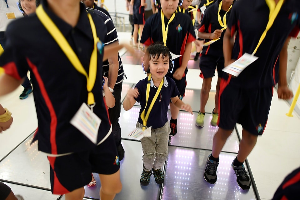 Children on the kinetic energy dance floor on day one of Shell Make The Future Singapore at the Changi Exhibition Centre, Thursday, March 8, 2018 in Singapore. (Edwin Koo/AP Images for Shell)