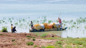 Local people on the Yabani Canal in the South of Iraq