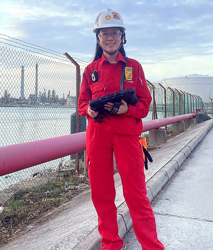 Polly on site at Pulau Bukom, where she typically troubleshoots engineering issues and reviews design calculations